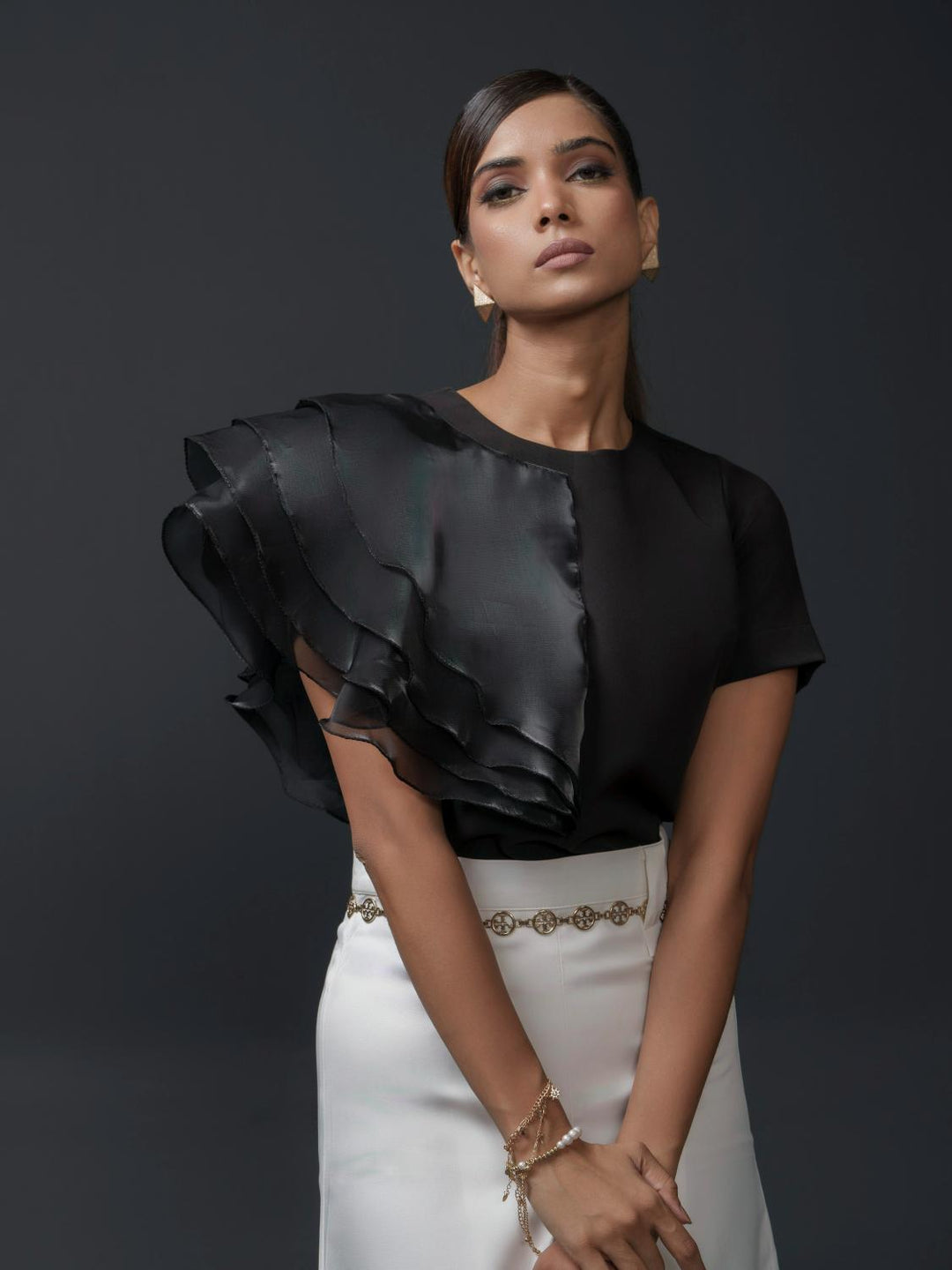 ruban club one sided ruffled top-a chic and elegant statement top featuring an asymmetric ruffle design, perfect for parties and special occasions.