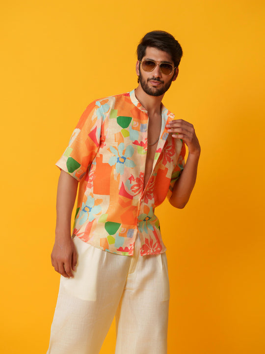 henry floral printed linen shirt-short sleeved, mandarin collar shirt for men. stylish and breathable available in orange and blue at The Kina
