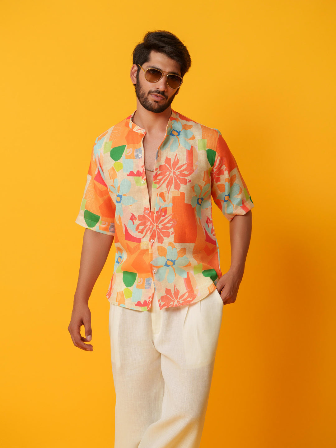 henry floral printed linen shirt-short sleeved, mandarin collar shirt for men. stylish and breathable available in orange and blue at The Kina