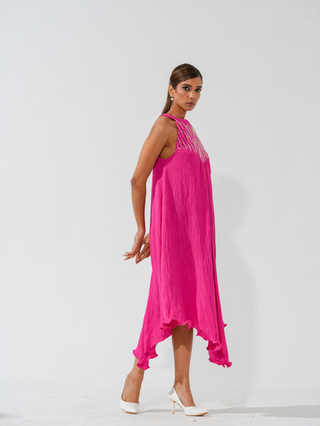 Bombshell - A flowy long dress in sleek corduroy with pearl work
