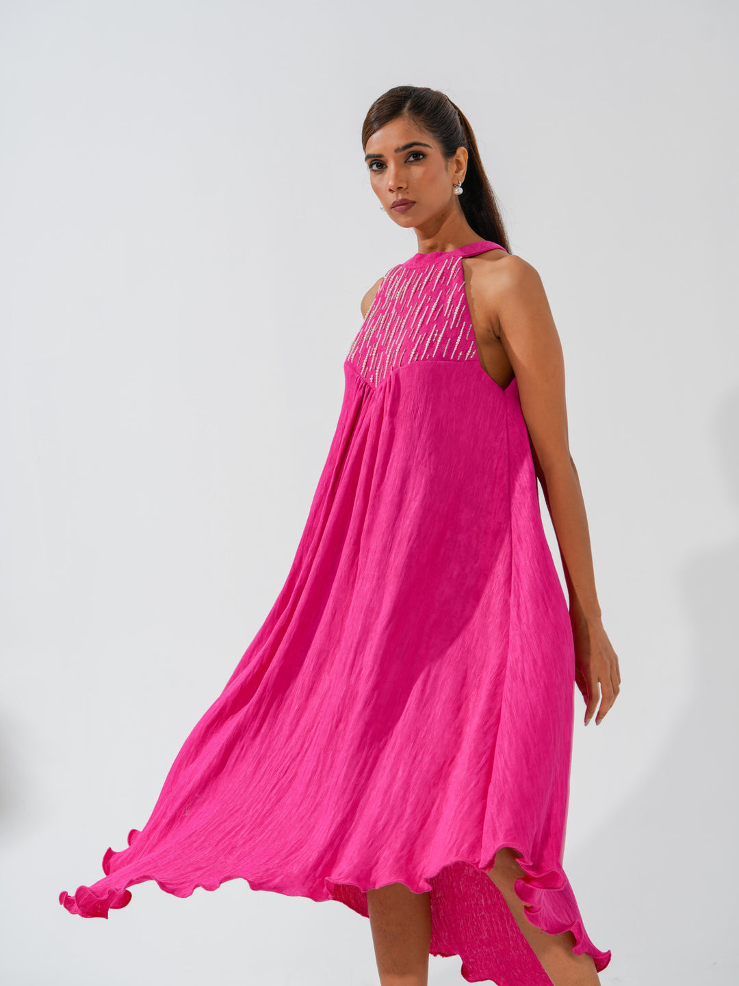 Bombshell - A flowy long dress in sleek corduroy with pearl work