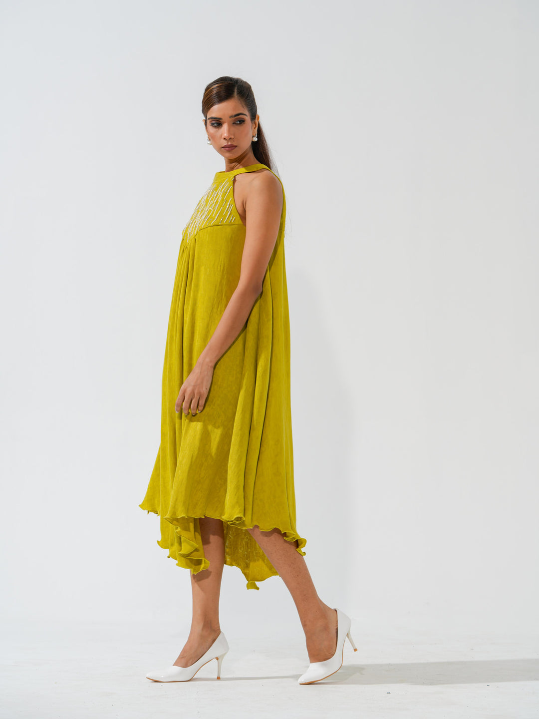 Bombshell - A flowy long dress in sleek corduroy with pearl work