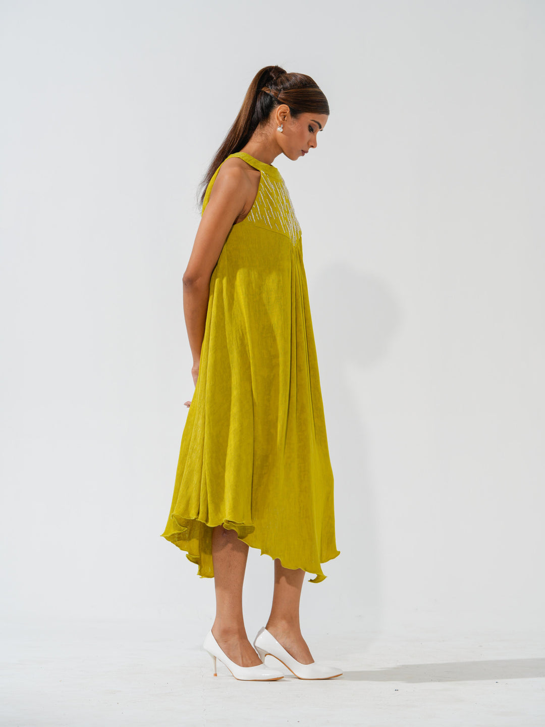 Bombshell - A flowy long dress in sleek corduroy with pearl work