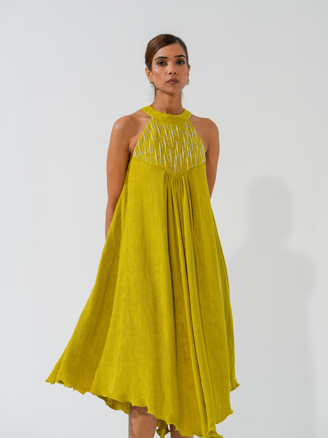 Bombshell - A flowy long dress in sleek corduroy with pearl work