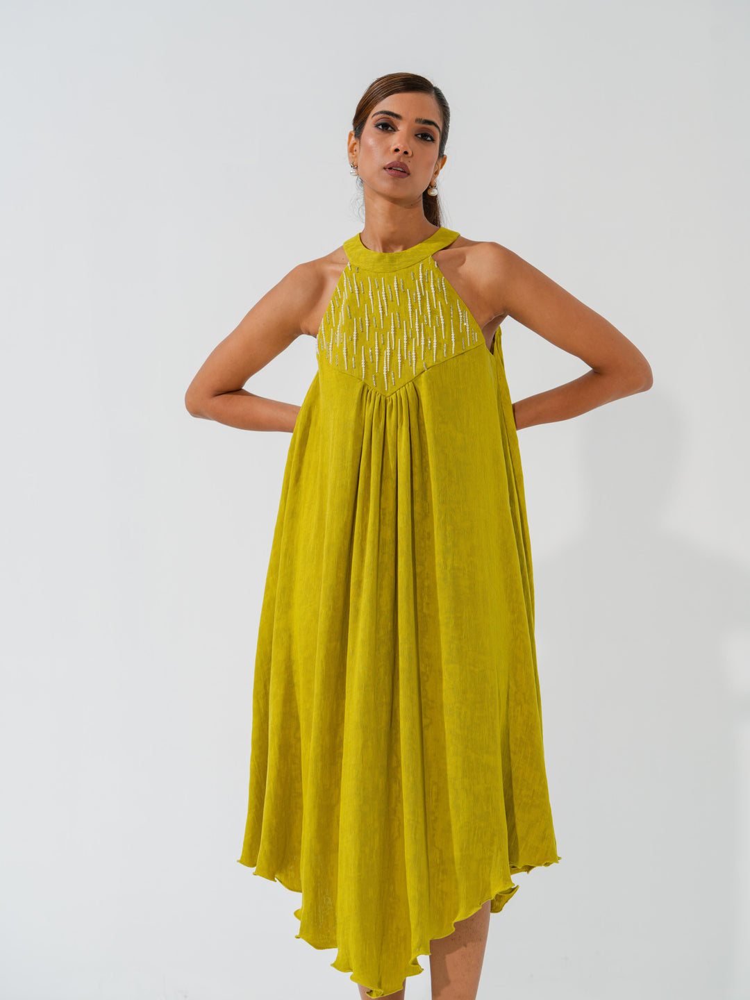 Bombshell - A flowy long dress in sleek corduroy with pearl work