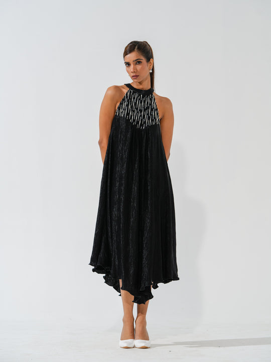 Bombshell - A flowy long dress in sleek corduroy with pearl work