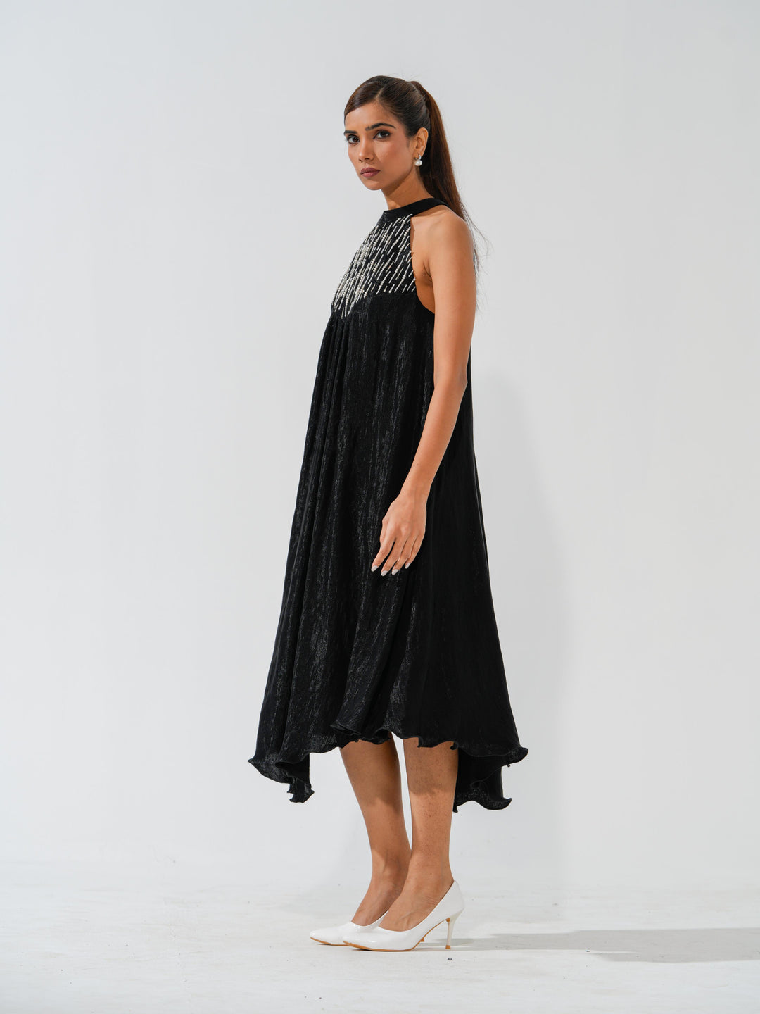 Bombshell - A flowy long dress in sleek corduroy with pearl work