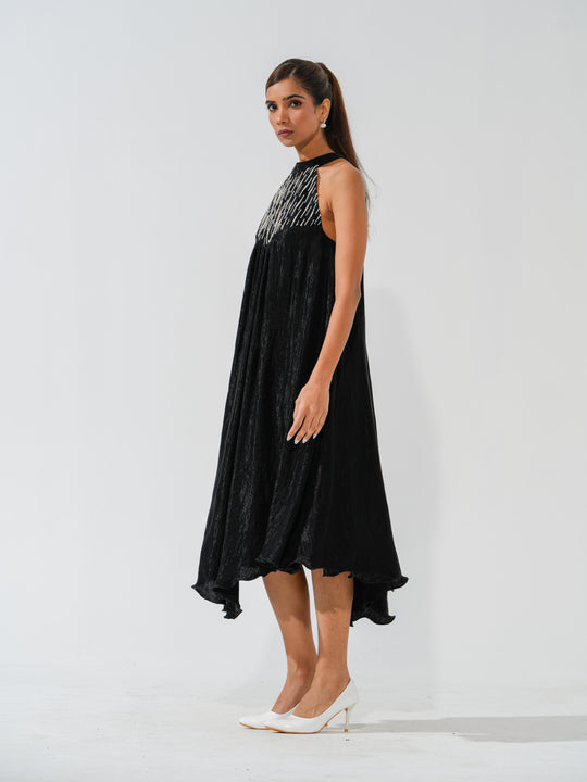 Bombshell - A flowy long dress in sleek corduroy with pearl work