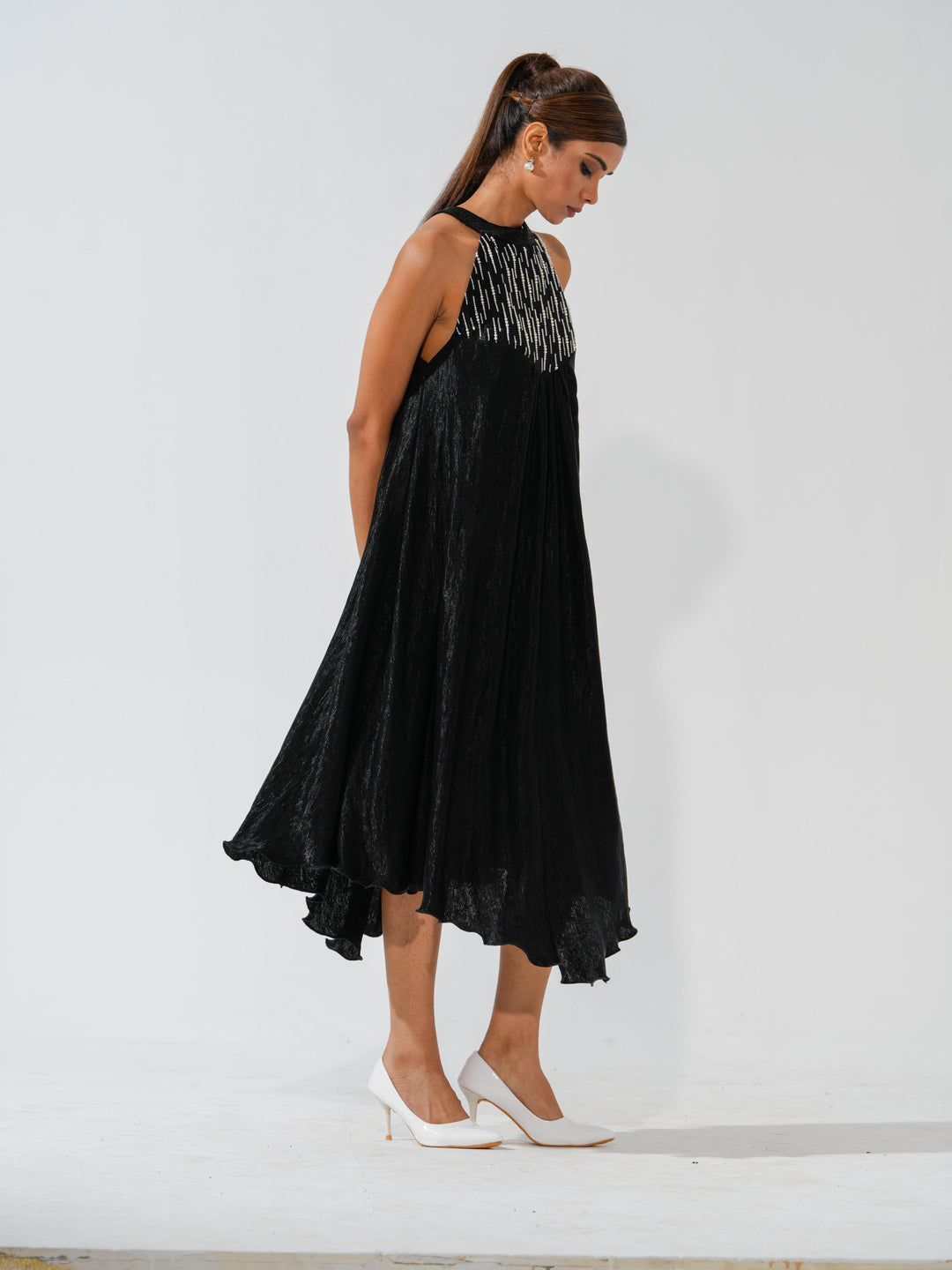 Bombshell - A flowy long dress in sleek corduroy with pearl work