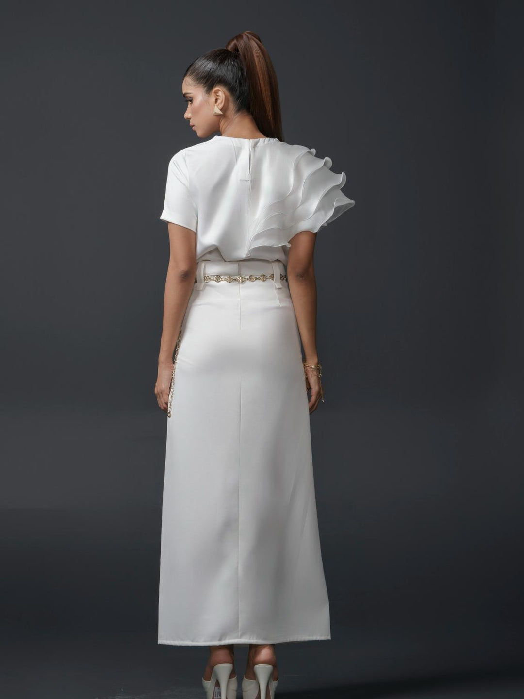 ruban club one sided ruffled top-a chic and elegant statement top featuring an asymmetric ruffle design, perfect for parties and special occasions.