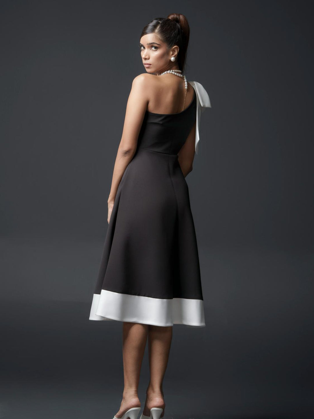 Christie Club One shoulder bow dress in Banana Lycra